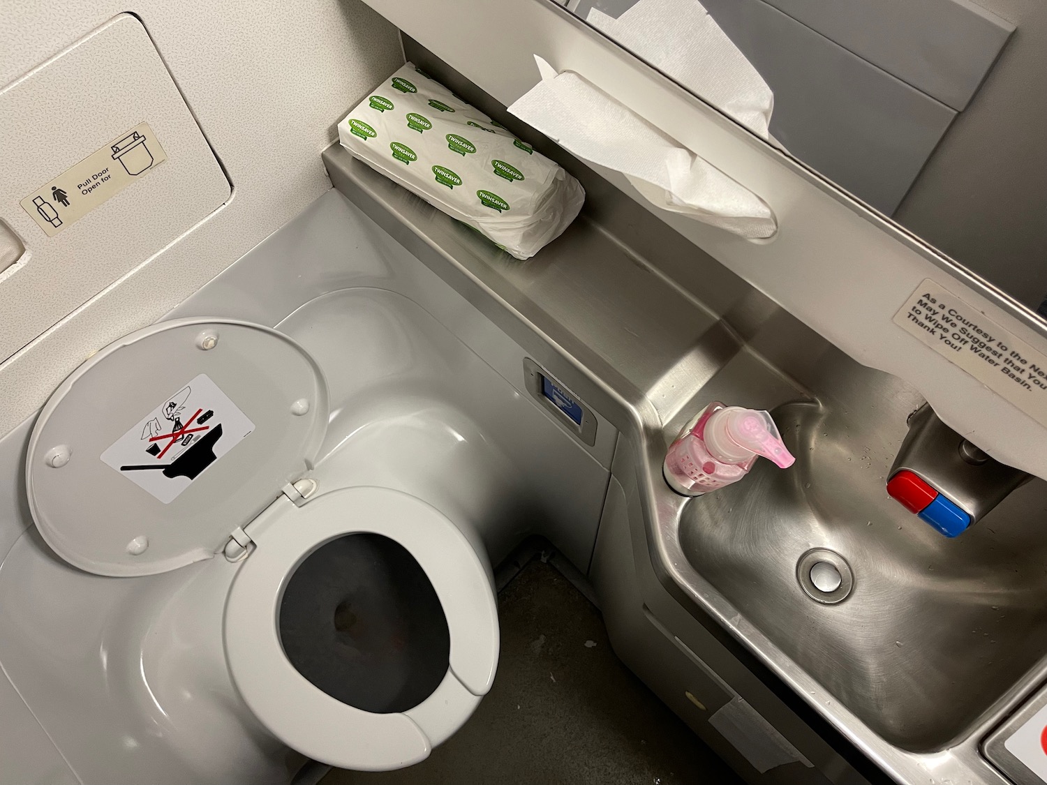 a toilet and sink in a bathroom