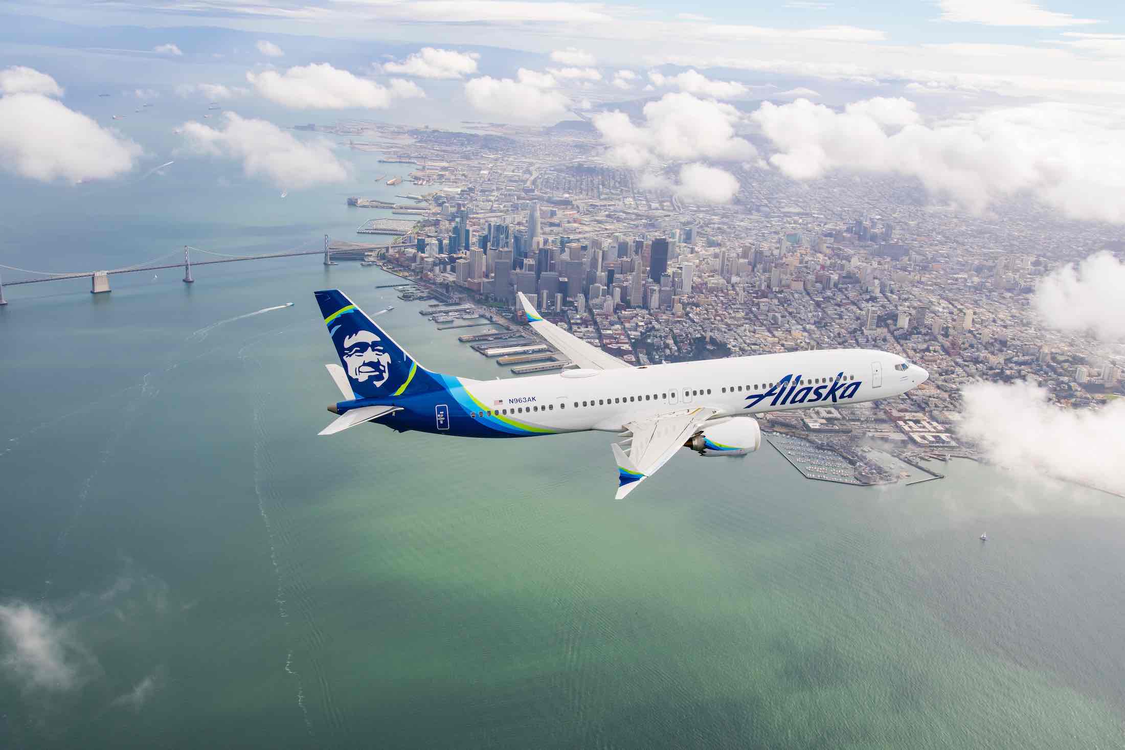 an airplane flying over a city