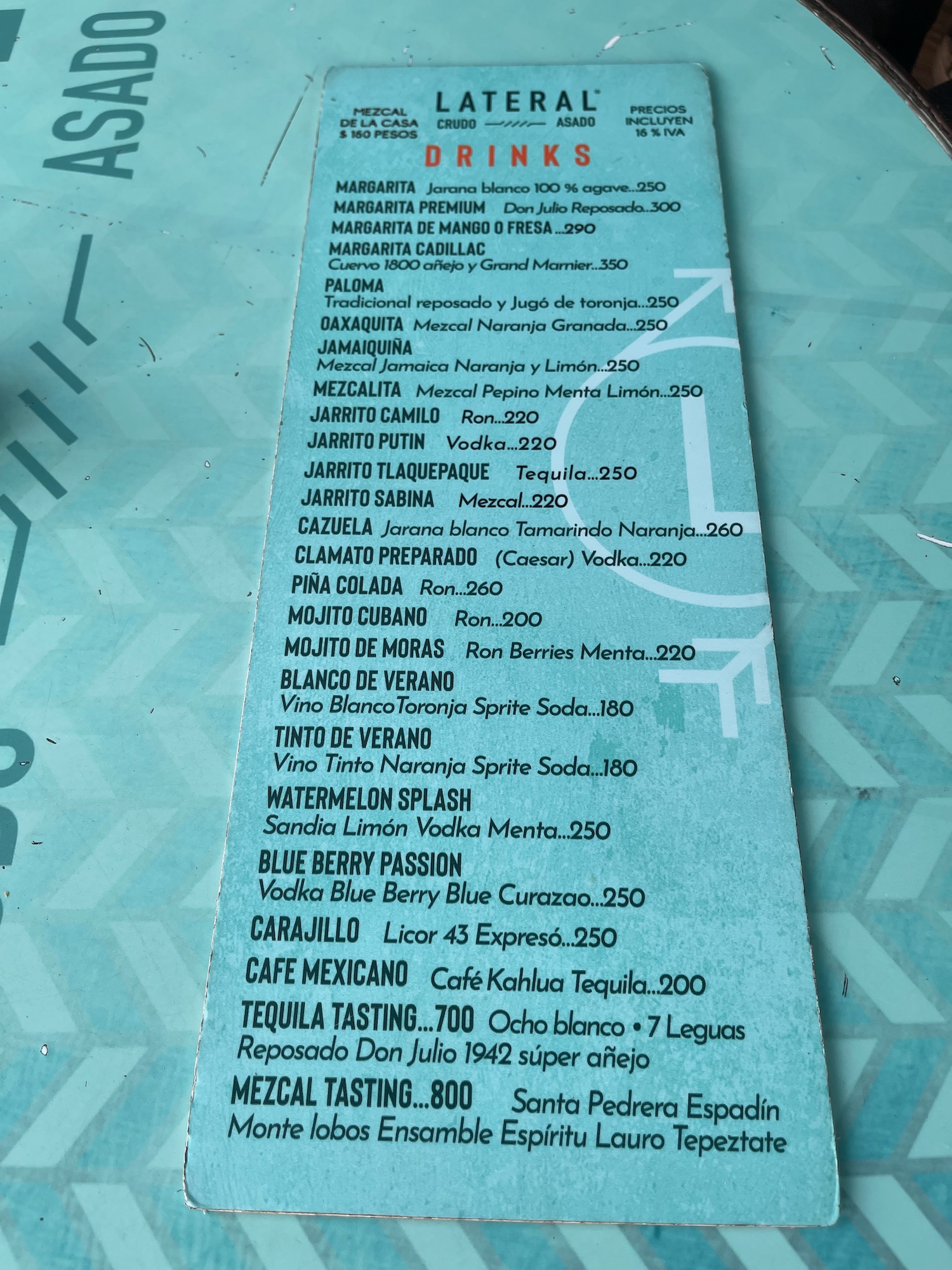a menu on a blue surface
