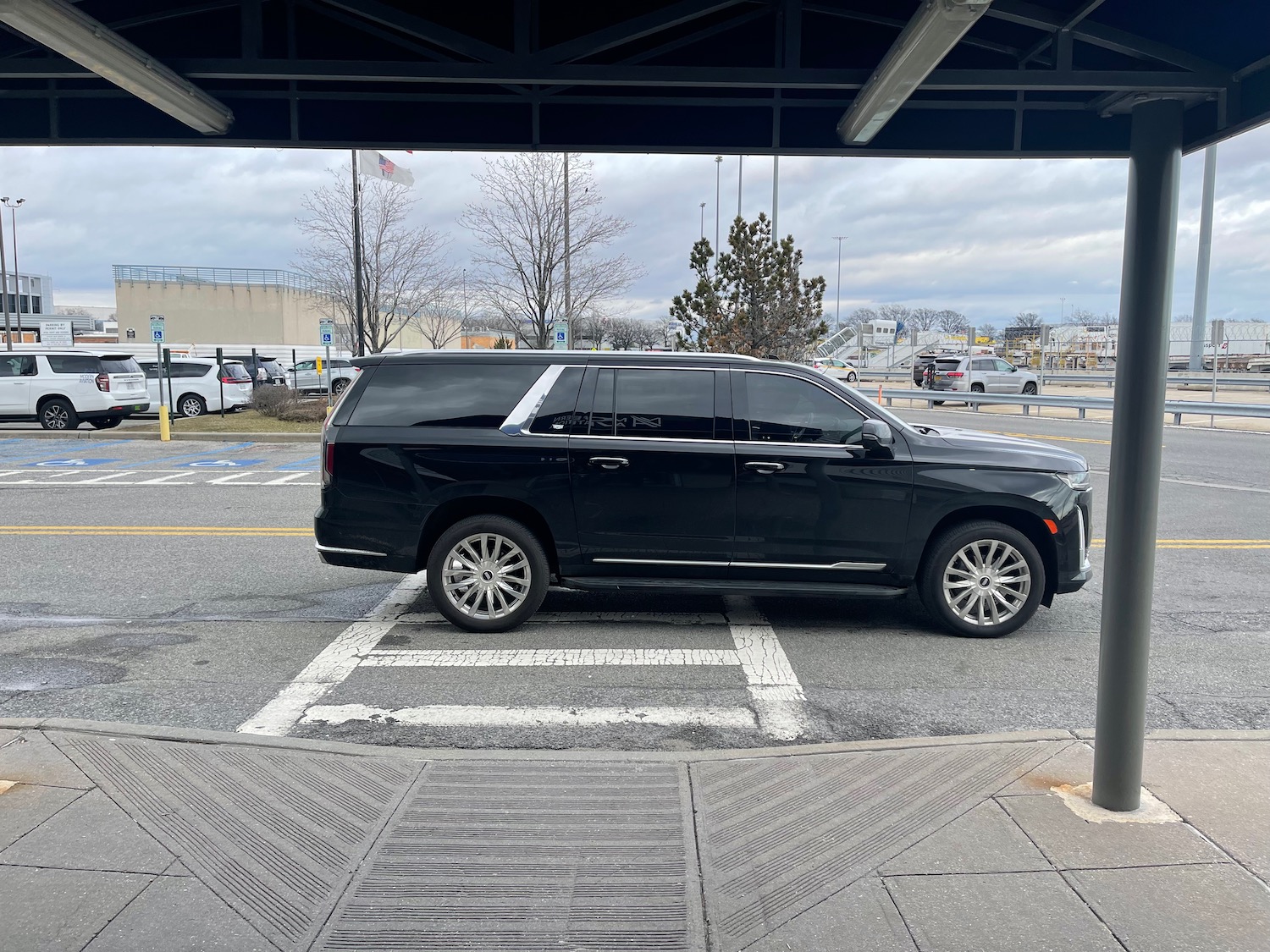 a black suv parked in a parking lot
