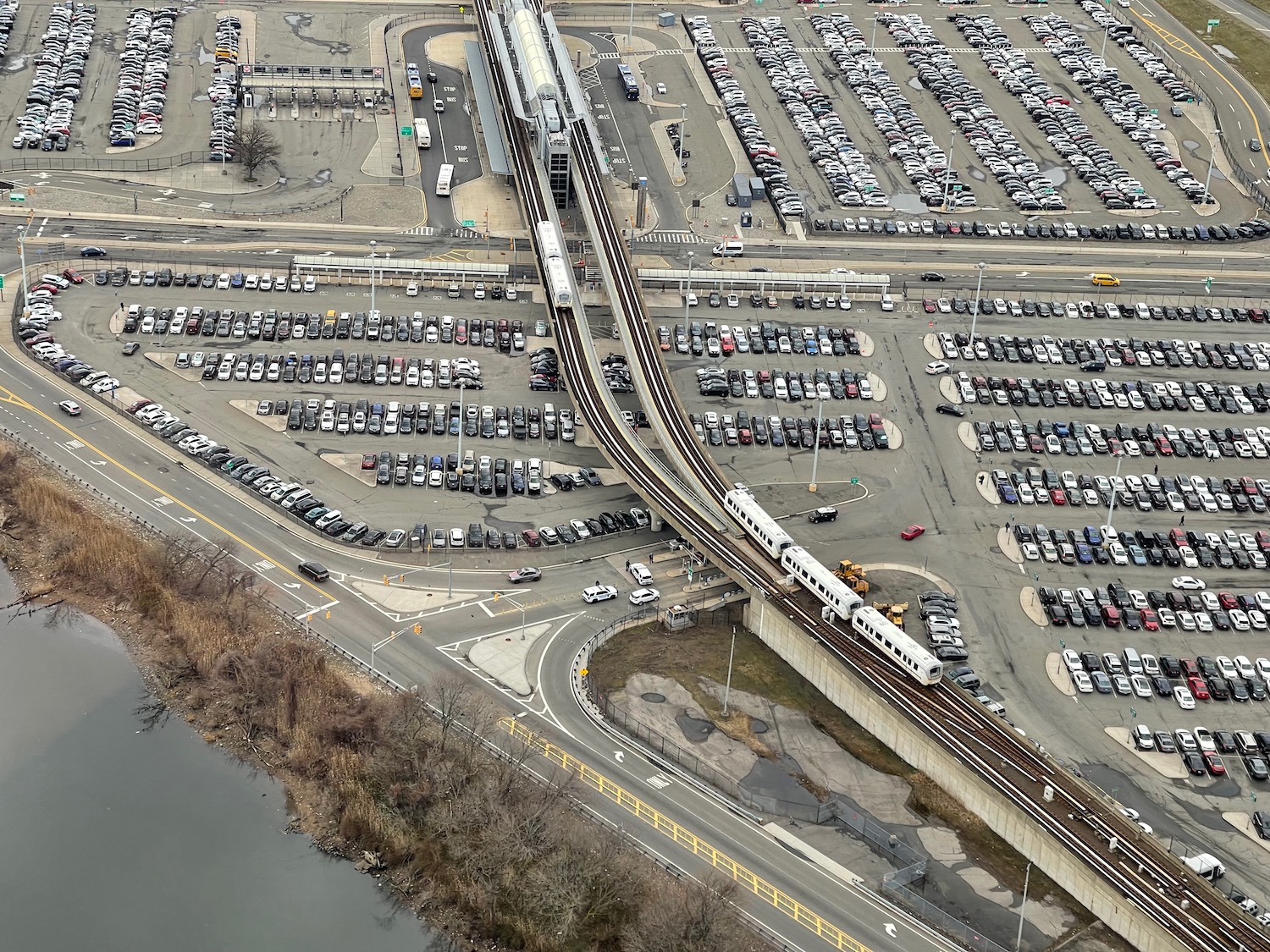 a train going over a parking lot