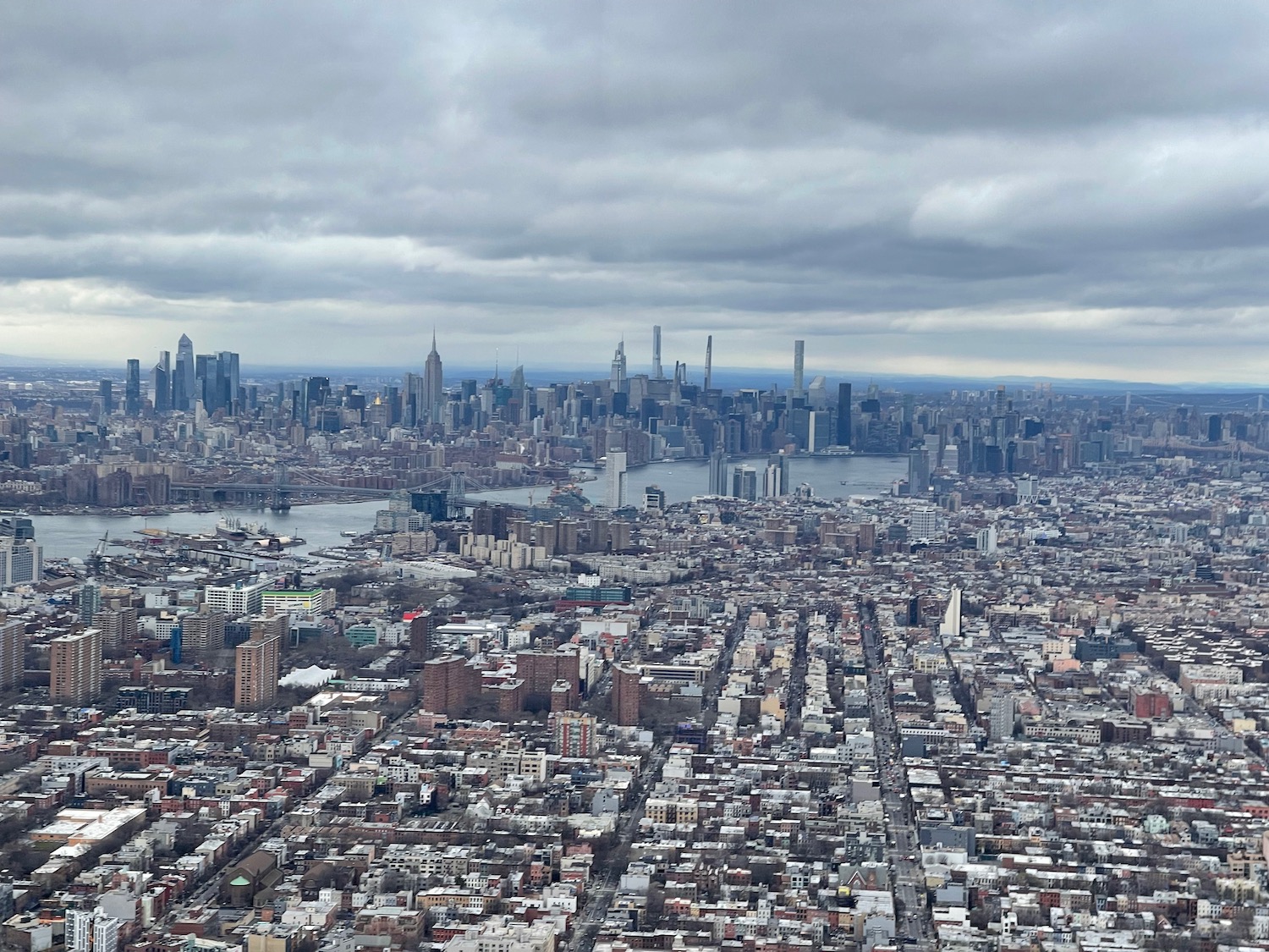 a city with many buildings and a body of water