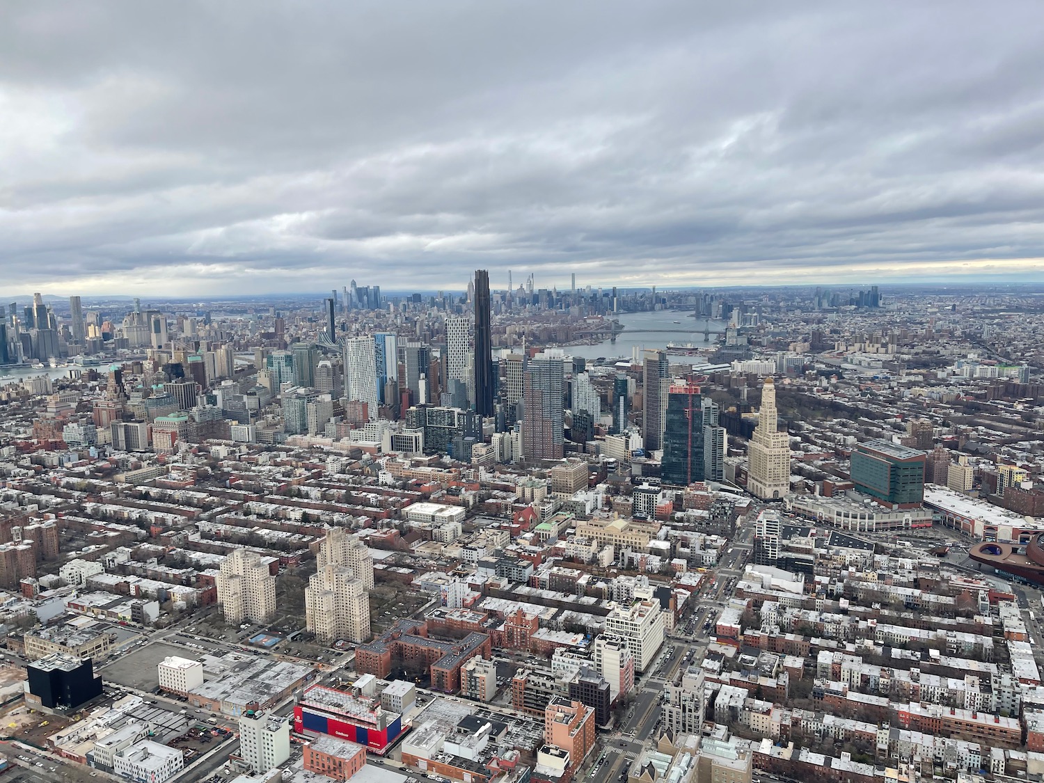 a city with many buildings and a body of water