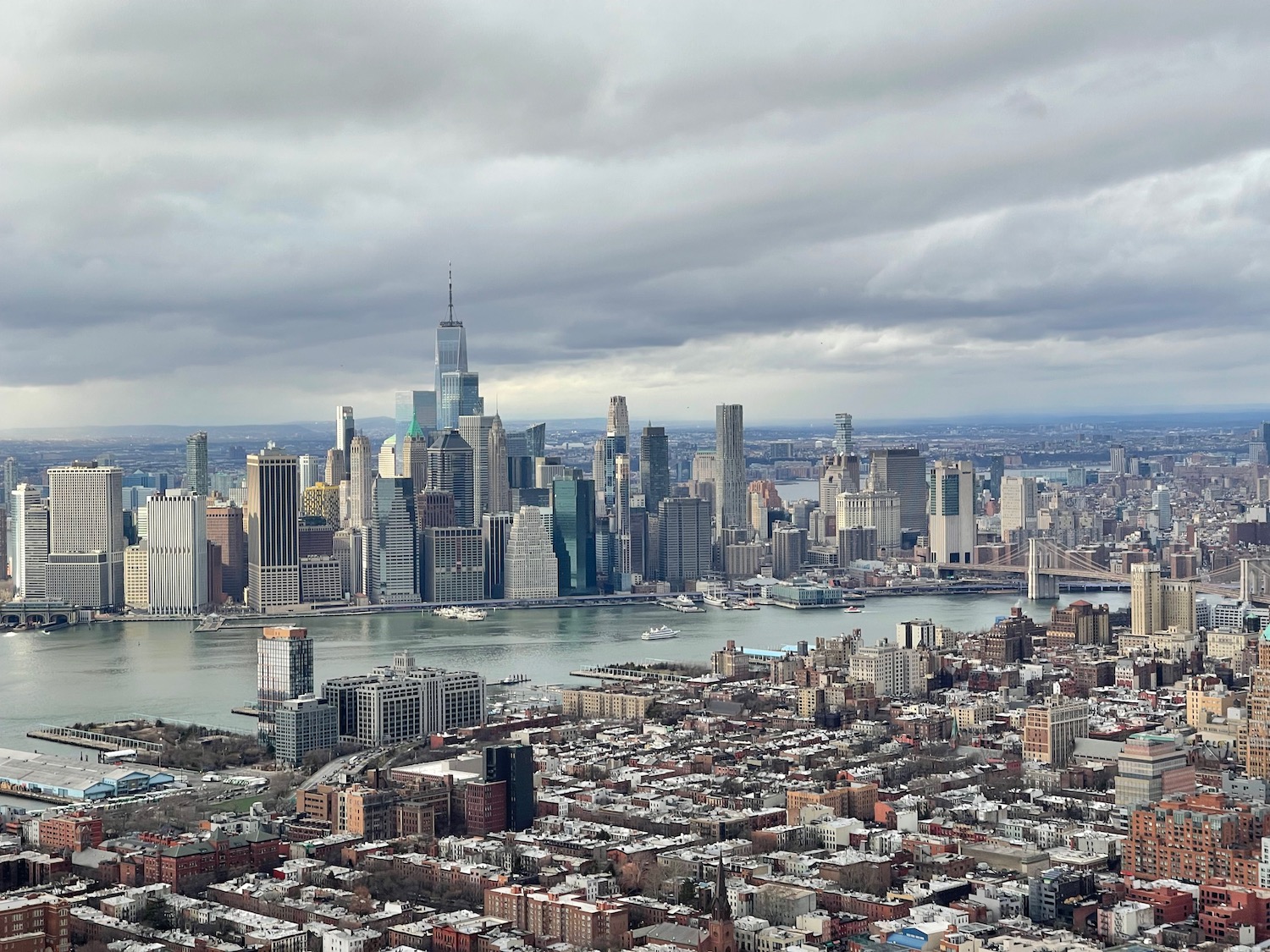 a city with many buildings and a body of water