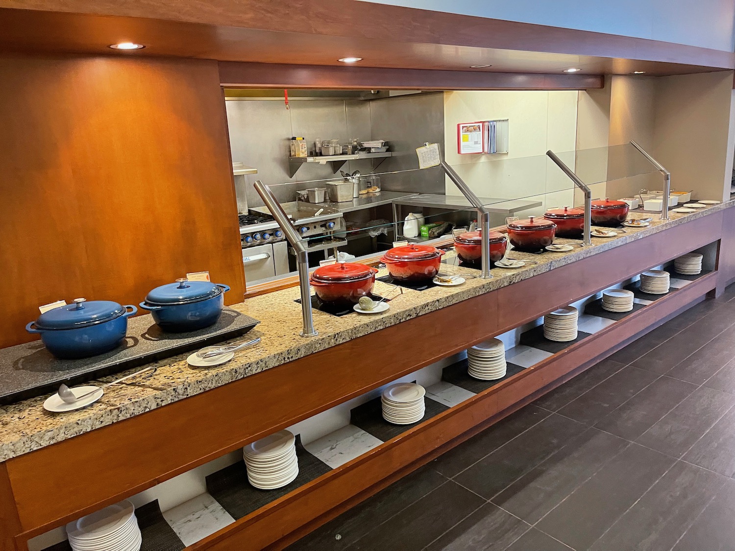 a row of pots on a counter