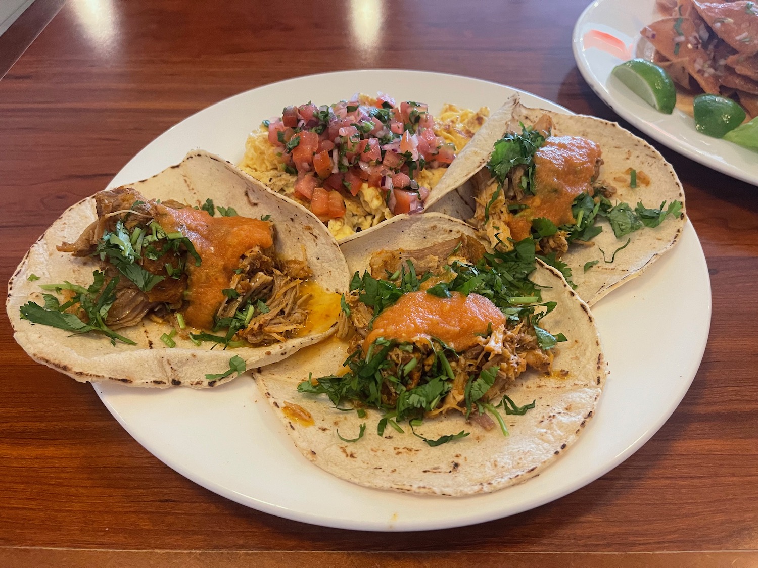 a plate of tacos on a table