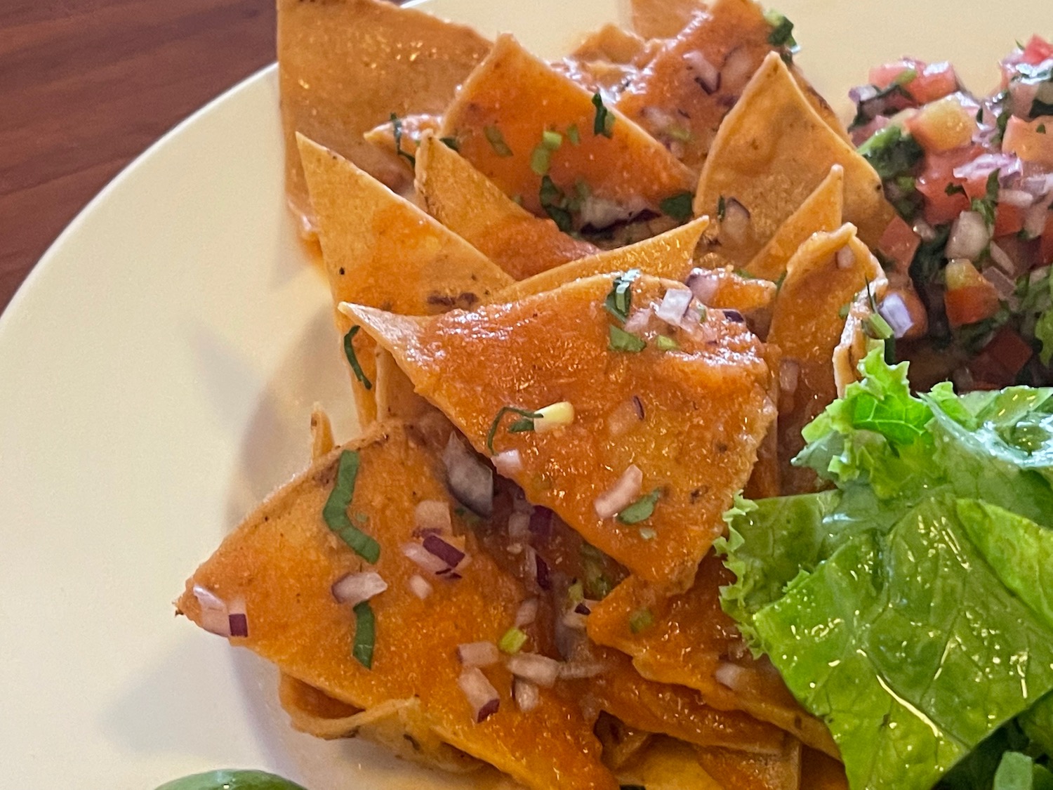 a plate of chips and salsa