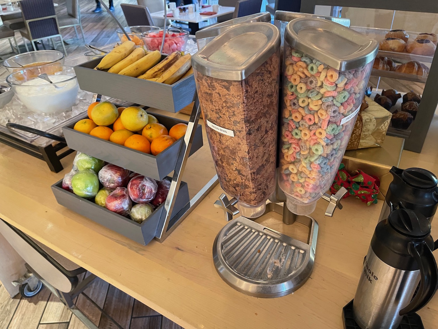 a table with cereal and fruit