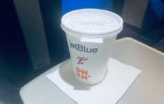 a white cup with a lid