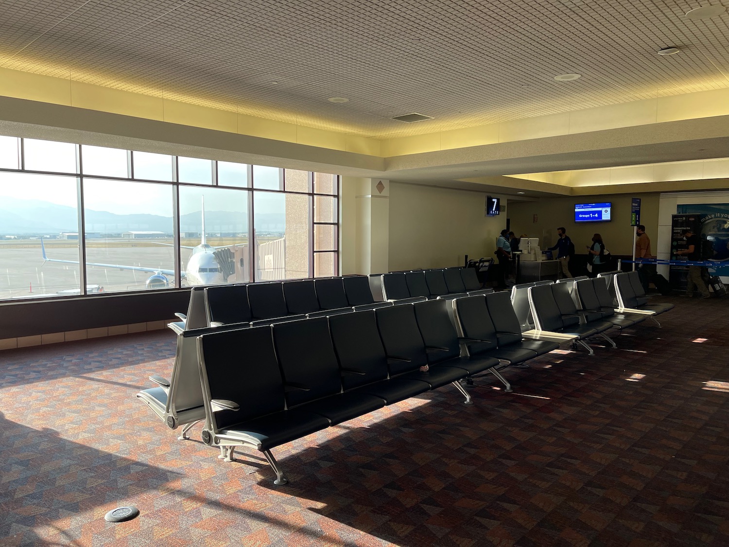 a row of chairs in an airport