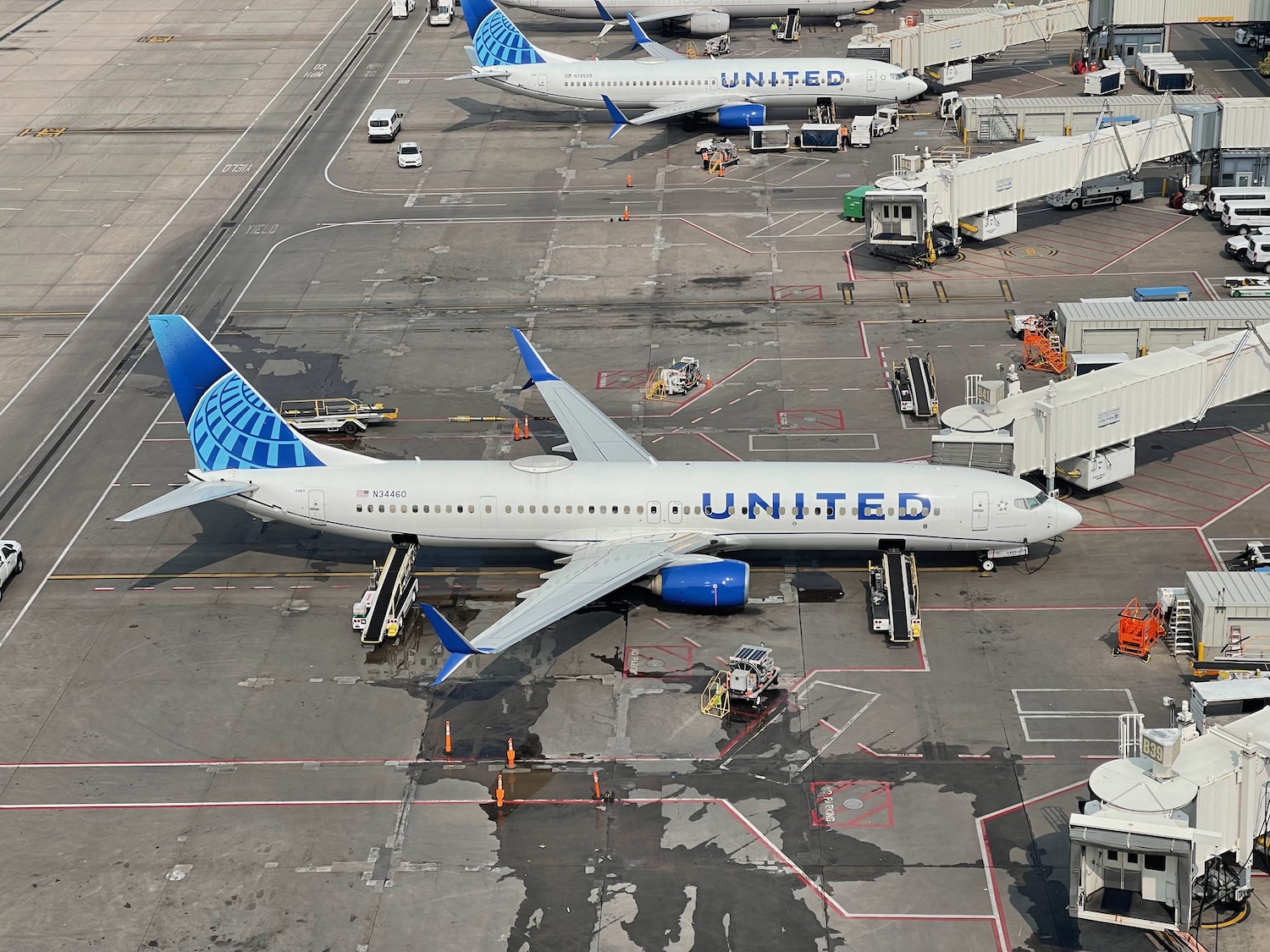 a group of airplanes at an airport