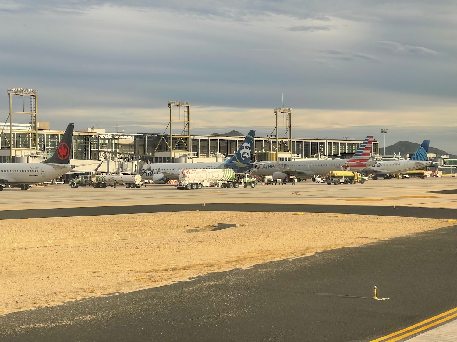 airplanes parked on a runway