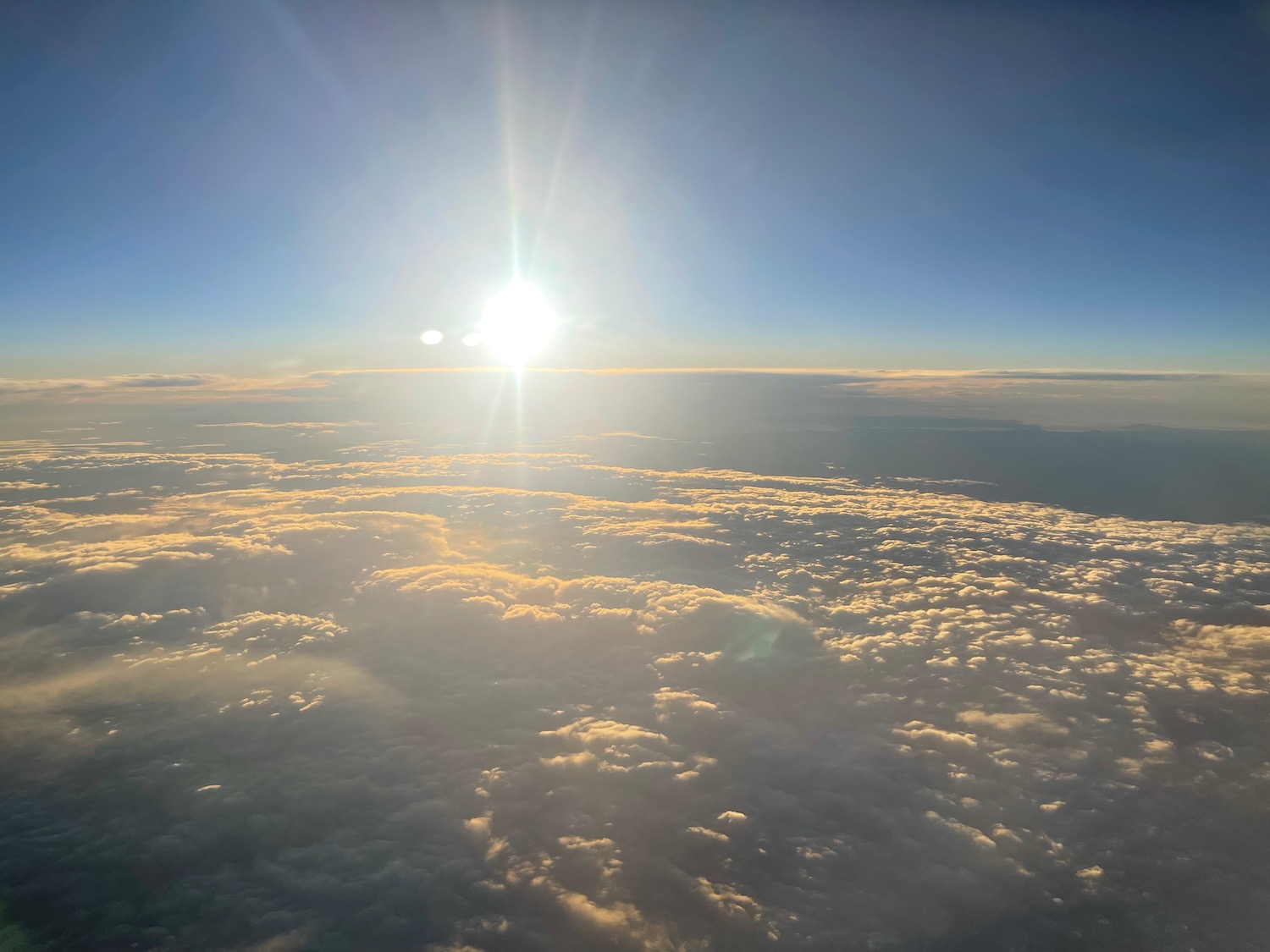 the sun above clouds