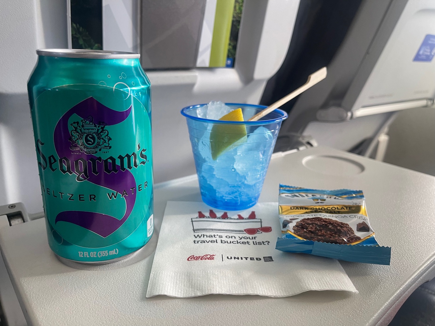 a drink and a drink on a plane