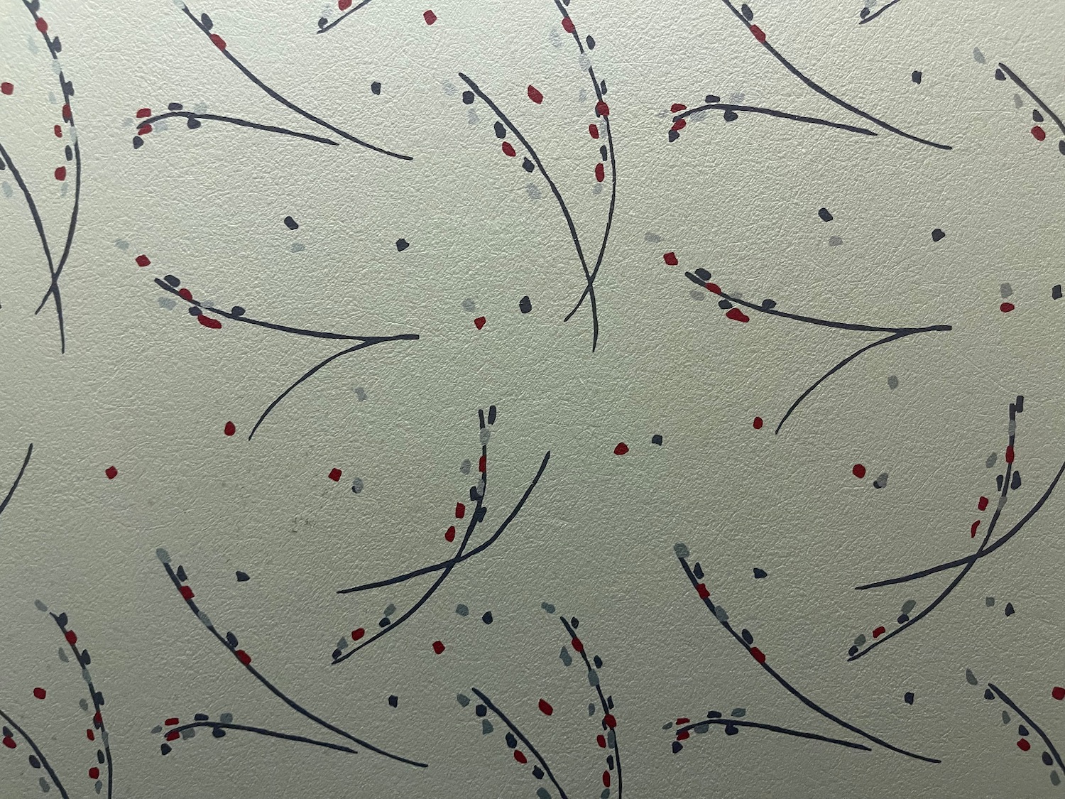 a pattern of flowers on a wall