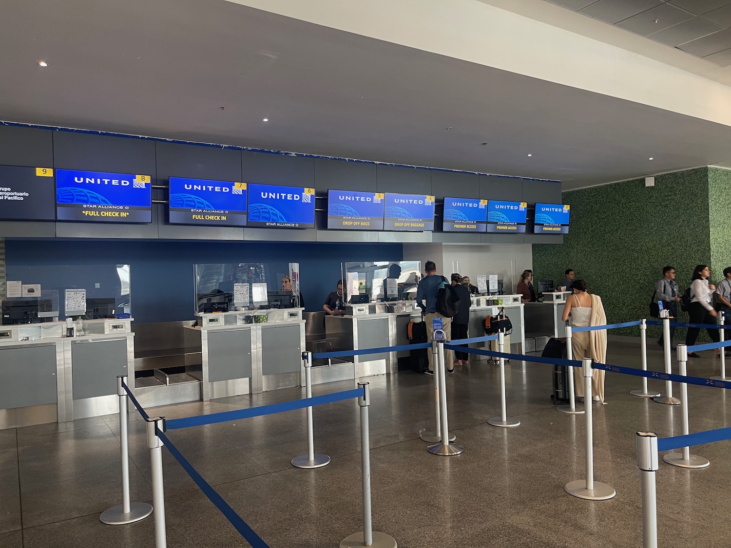 people standing in front of a counter