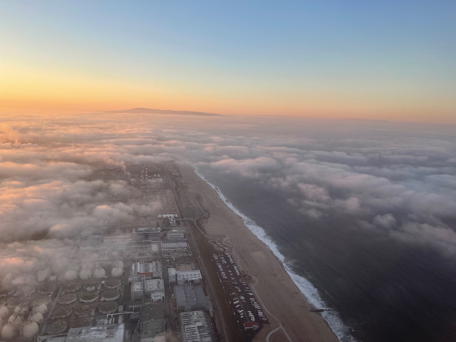 aerial view of a beach and clouds