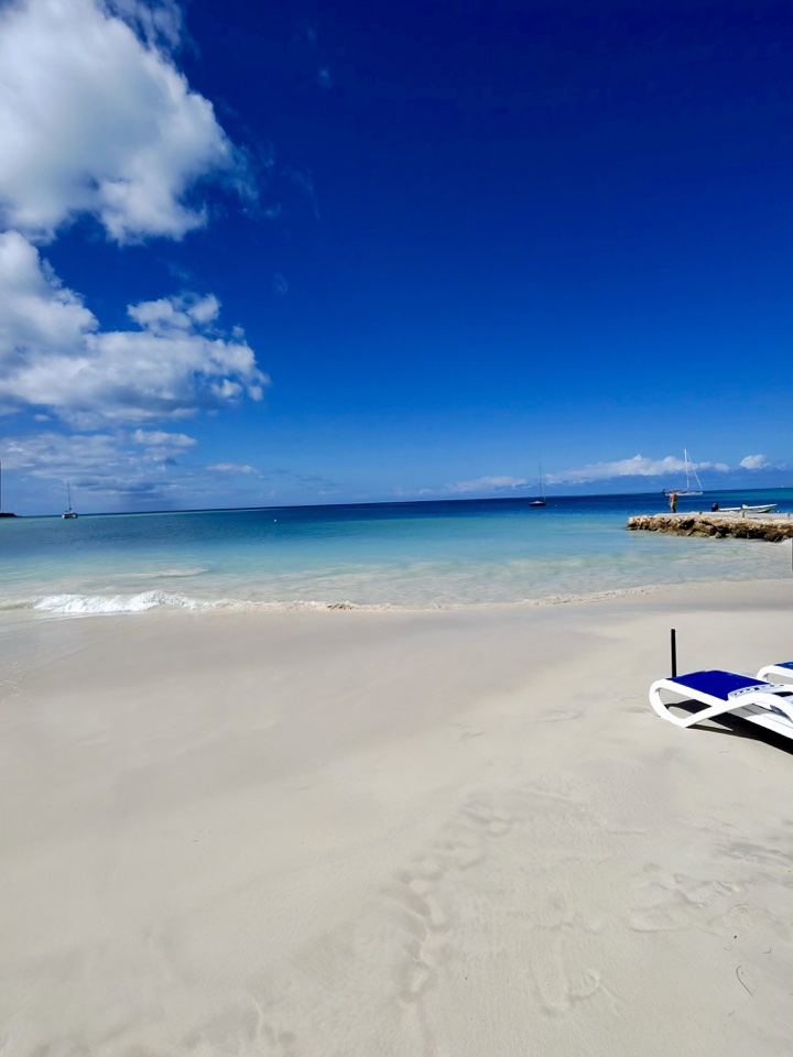 st johns antigua sandy beach and chairs