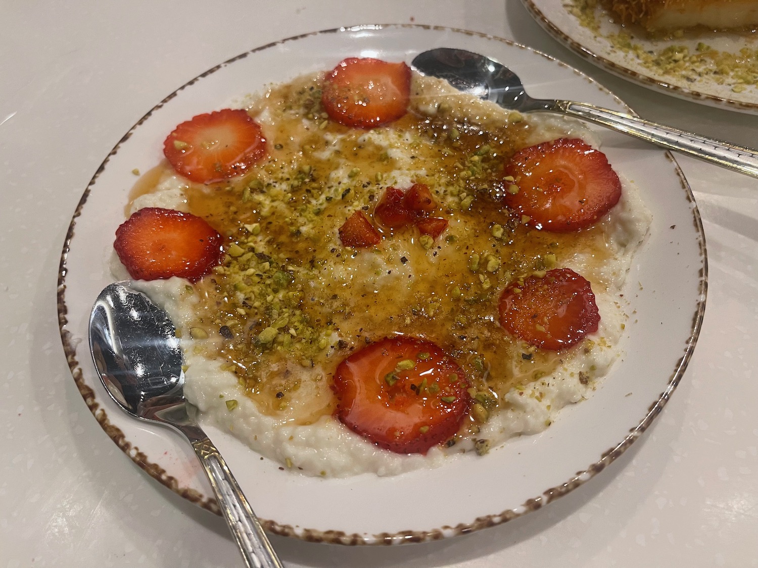 a plate of food with spoons