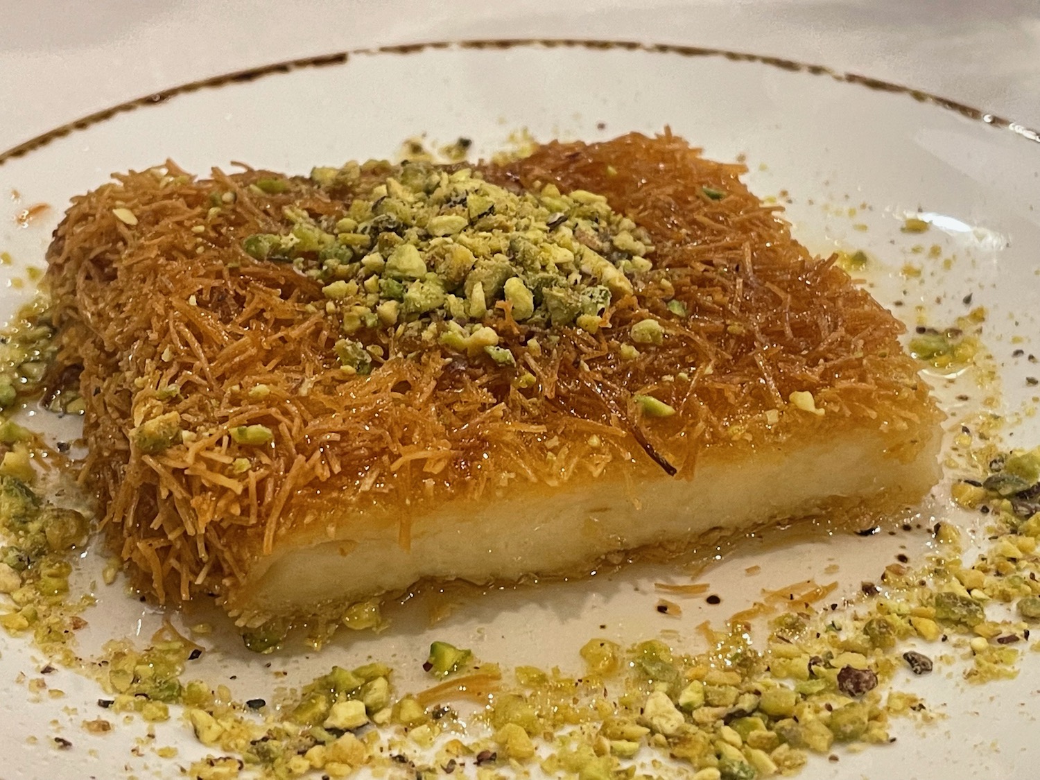 a plate of food on a white surface