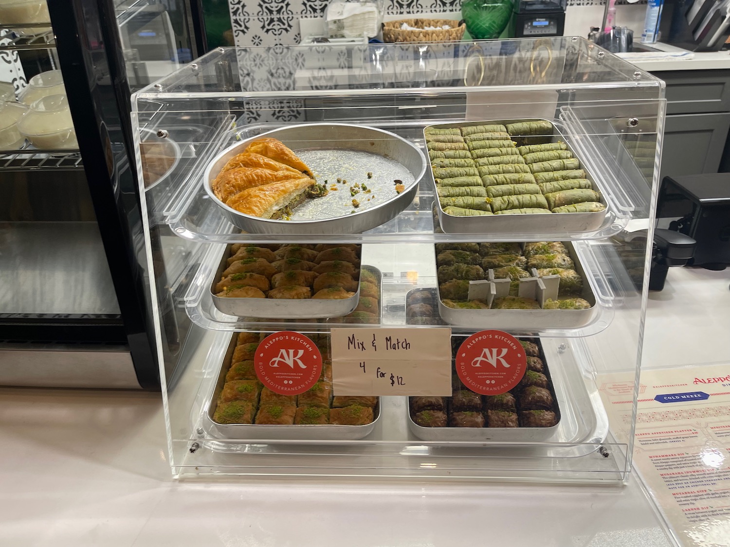 a display case with different types of food