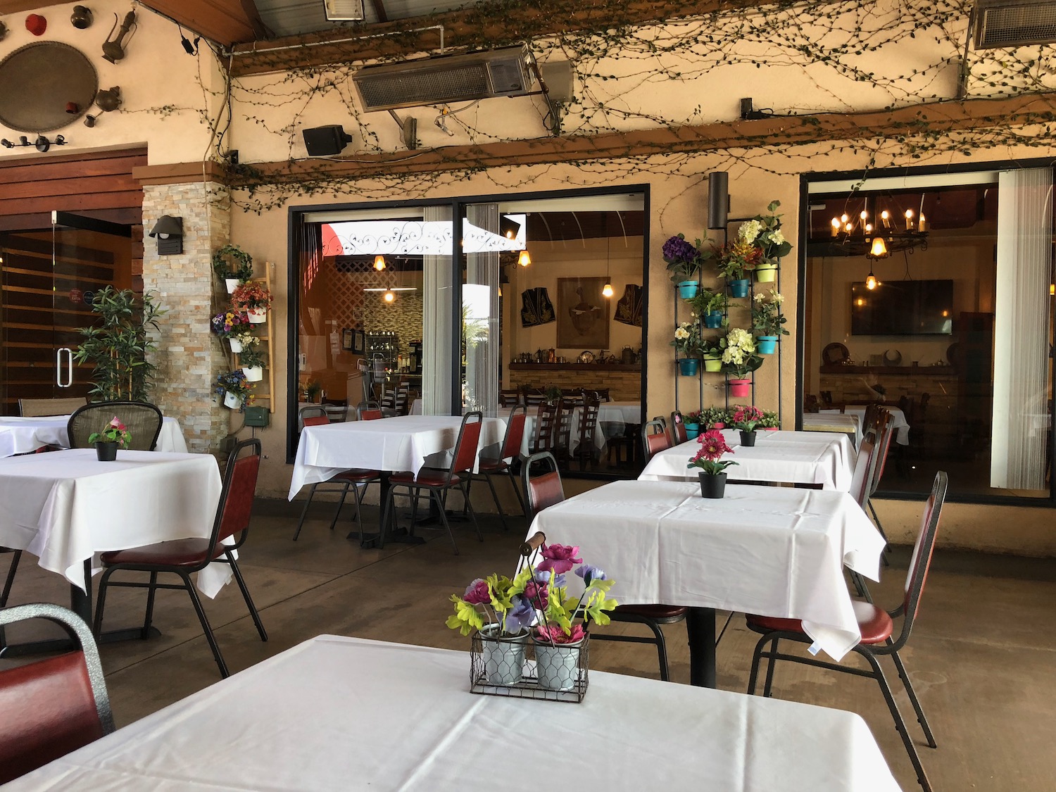 a tables and chairs outside a restaurant