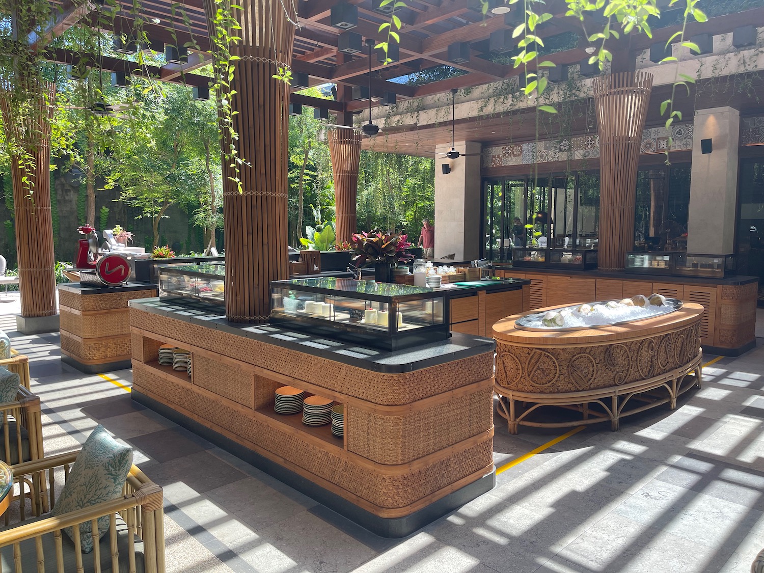 a restaurant with a large counter and a large tub