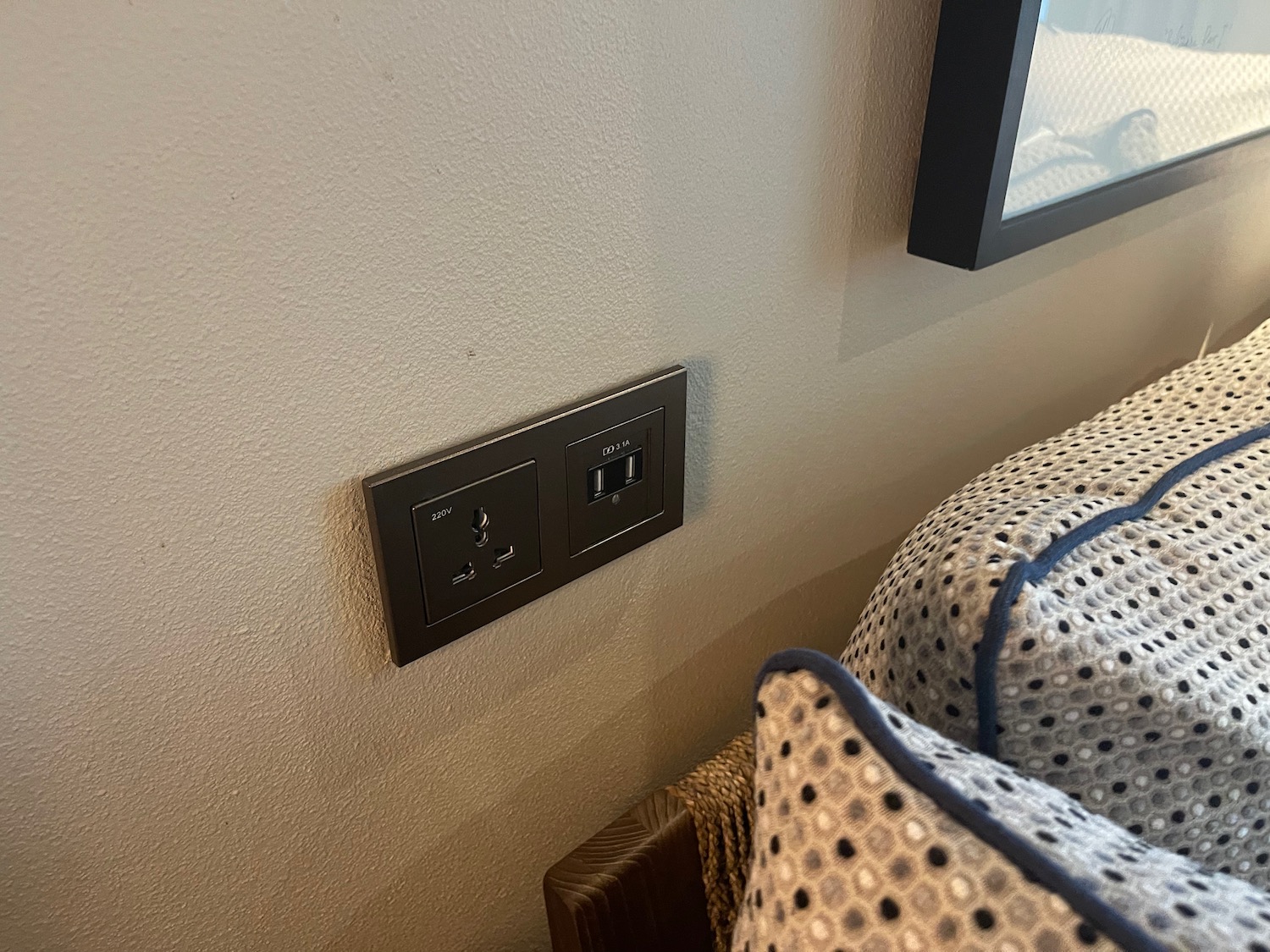 a wall outlet and a picture frame