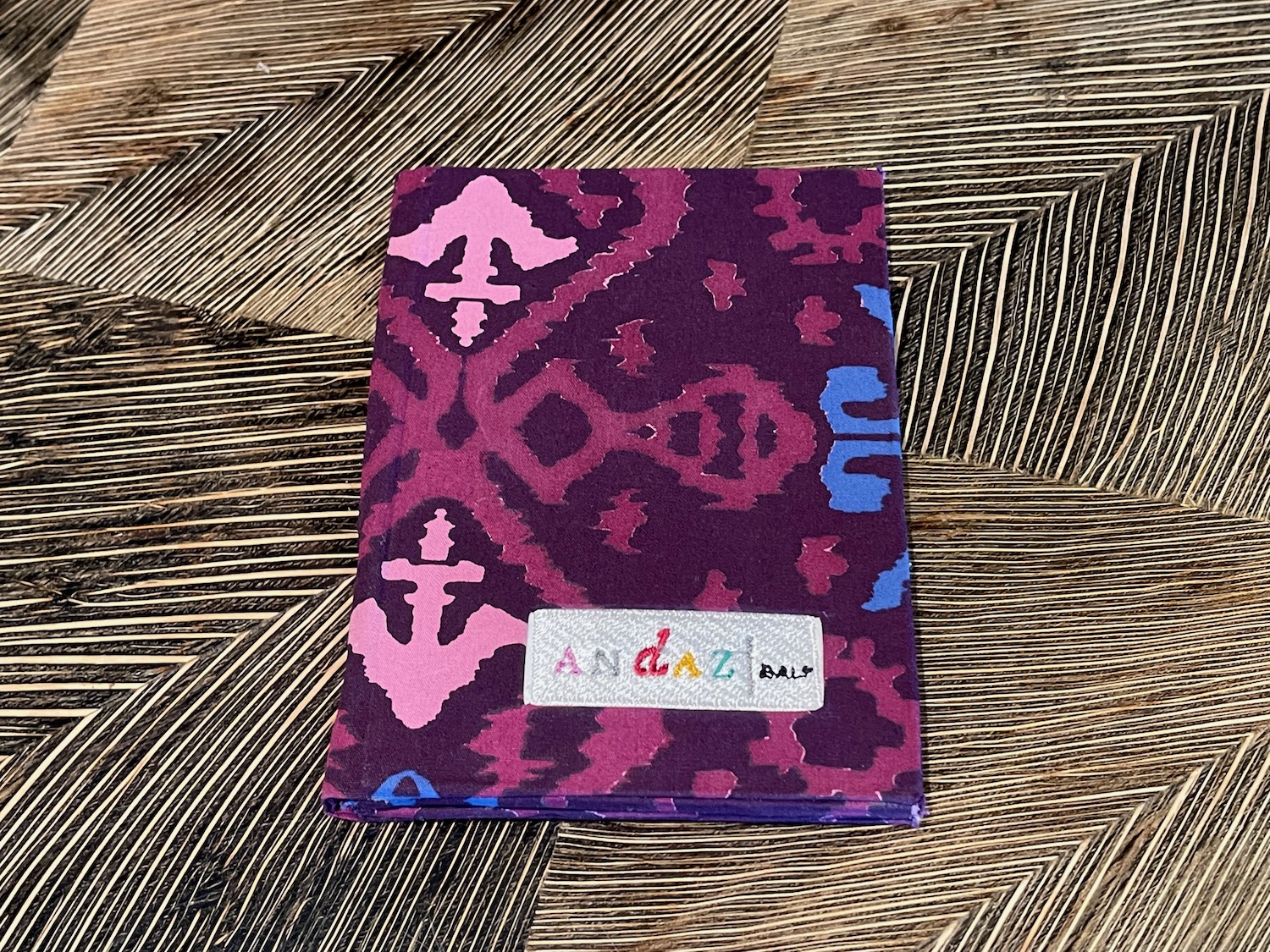 a purple and pink patterned book