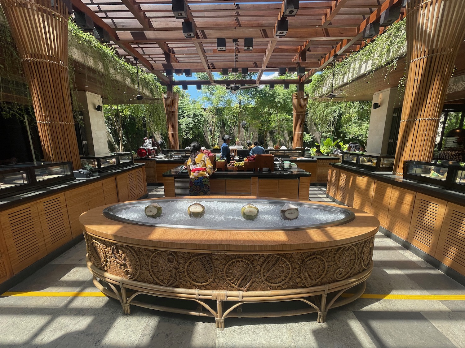 a large oval table with a wooden surface