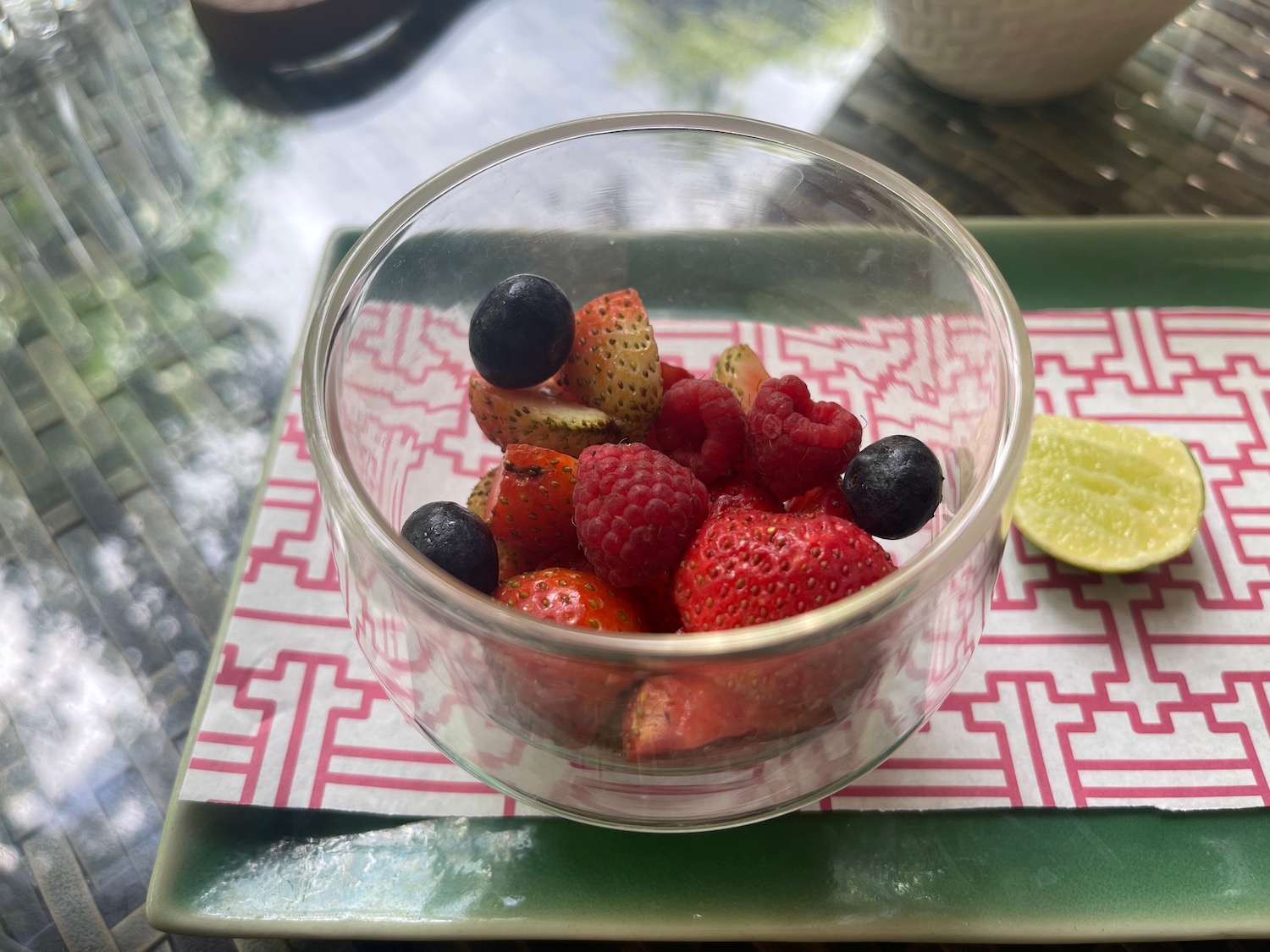 a bowl of fruit on a plate