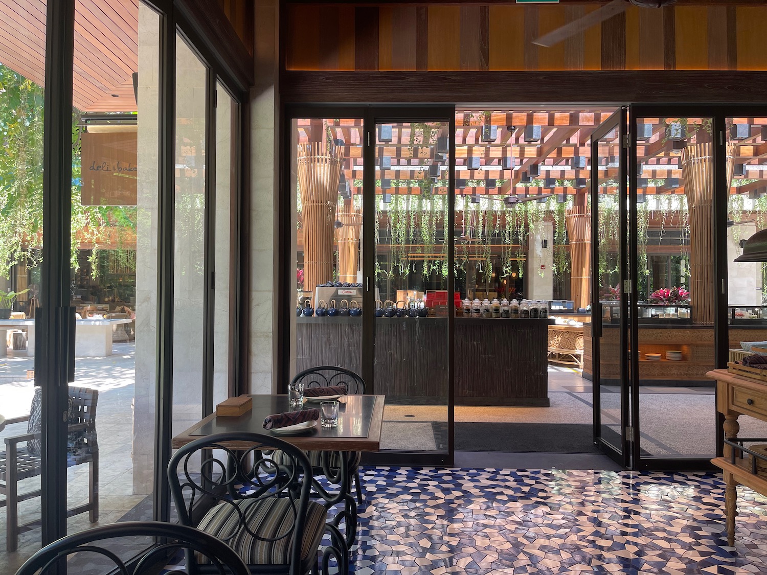 a glass doors leading to a restaurant