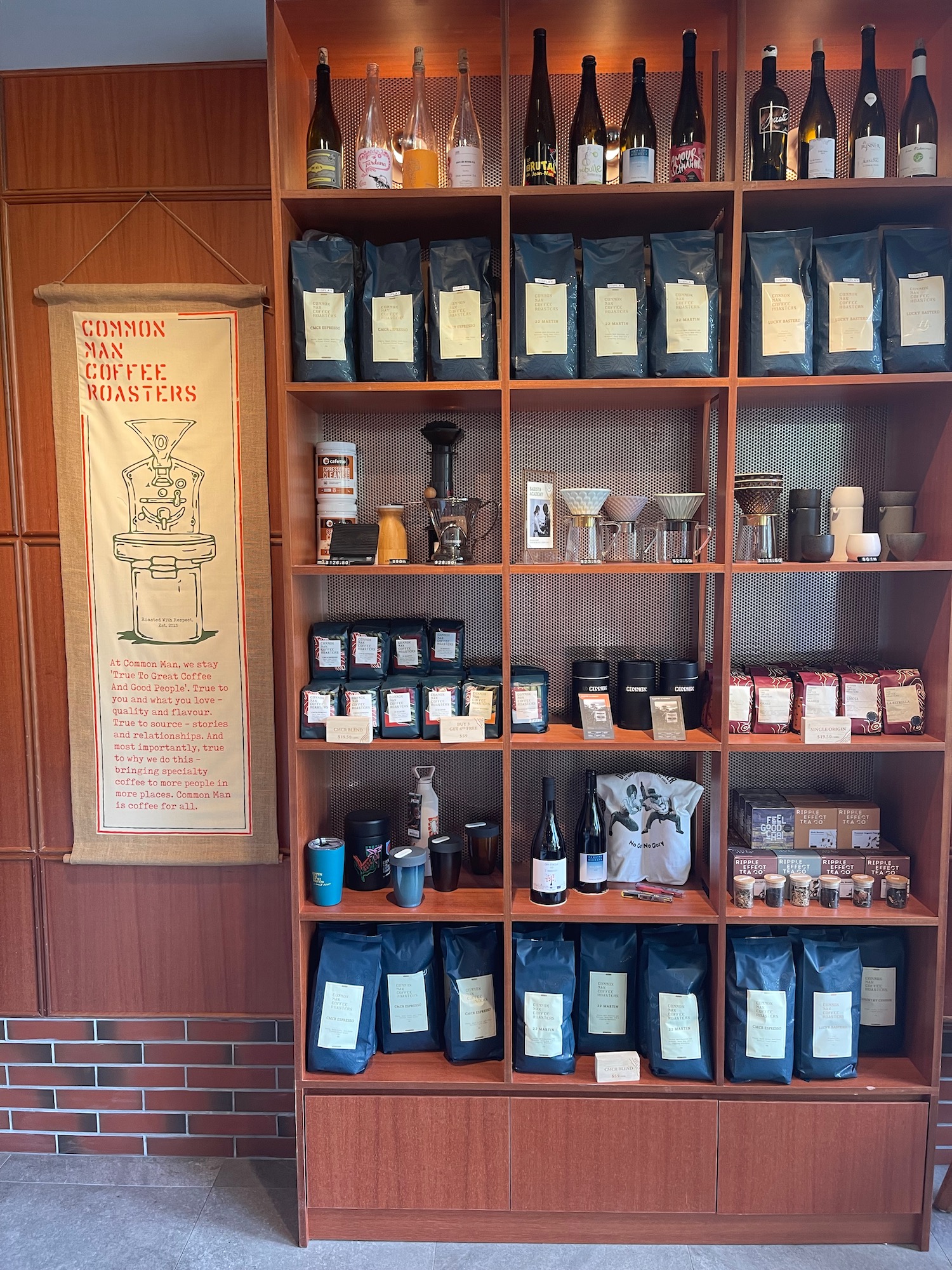 a shelf with different types of coffee items