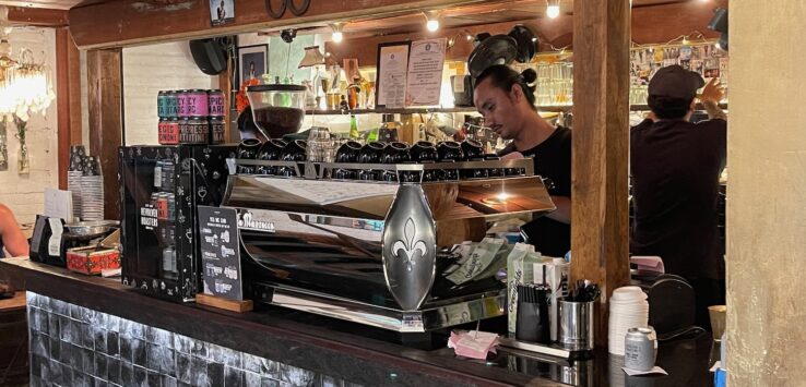 a man behind a counter