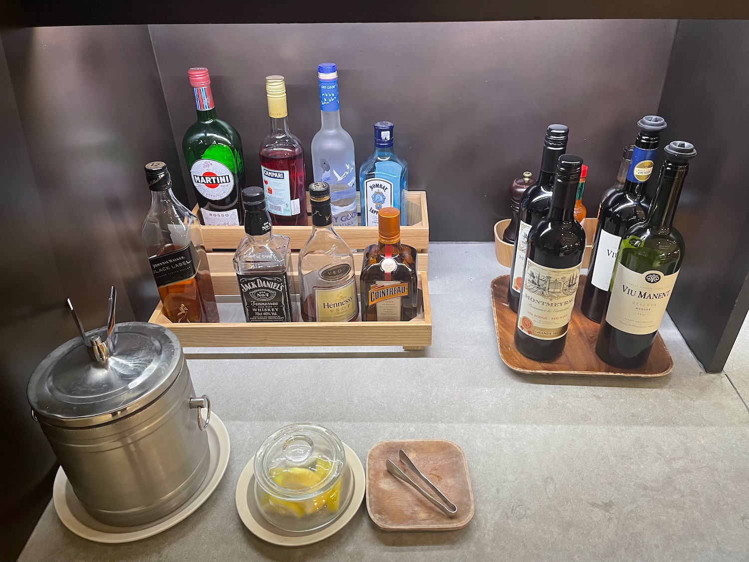 a group of bottles of alcohol on a counter