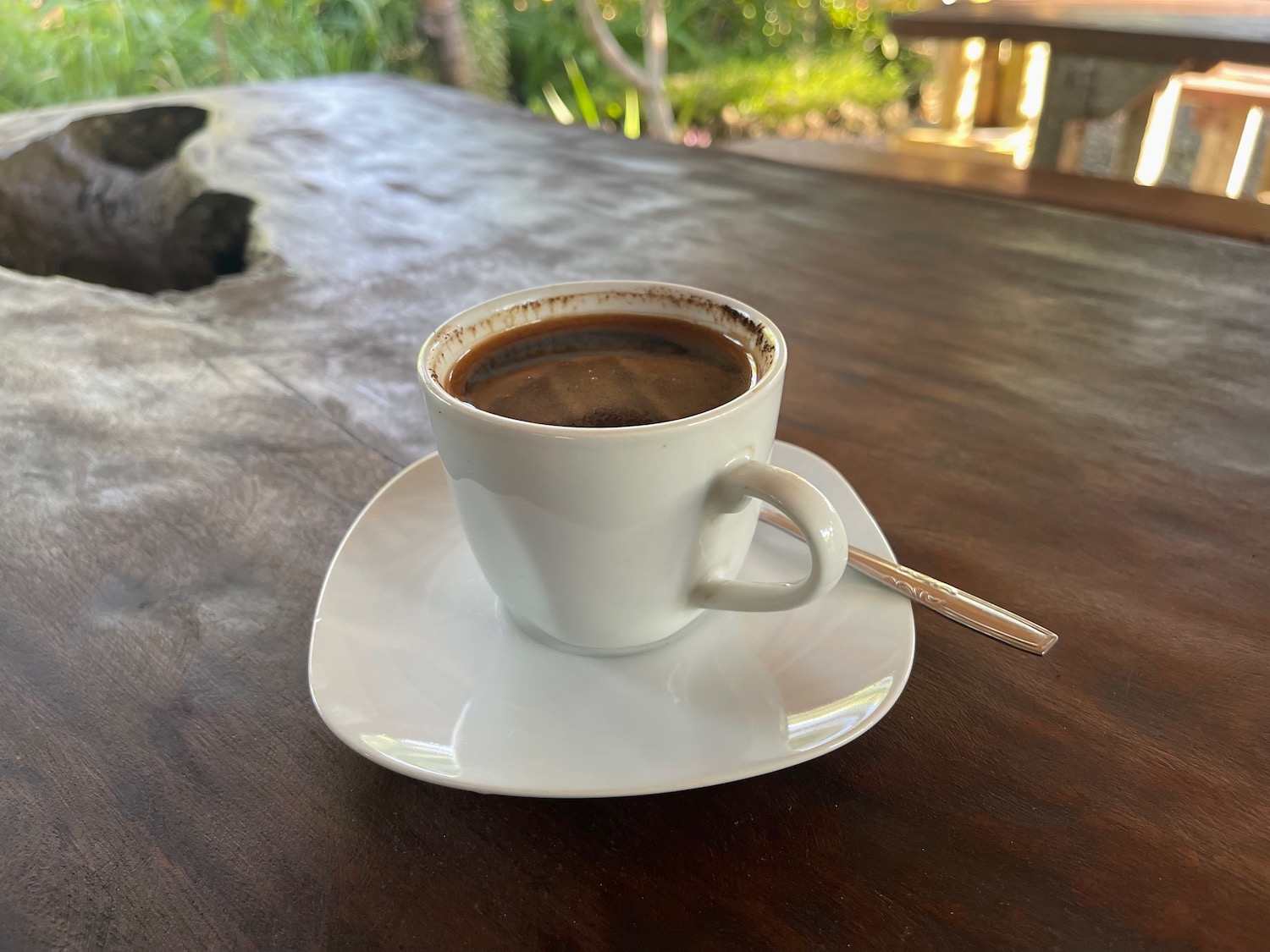 a cup of coffee on a saucer