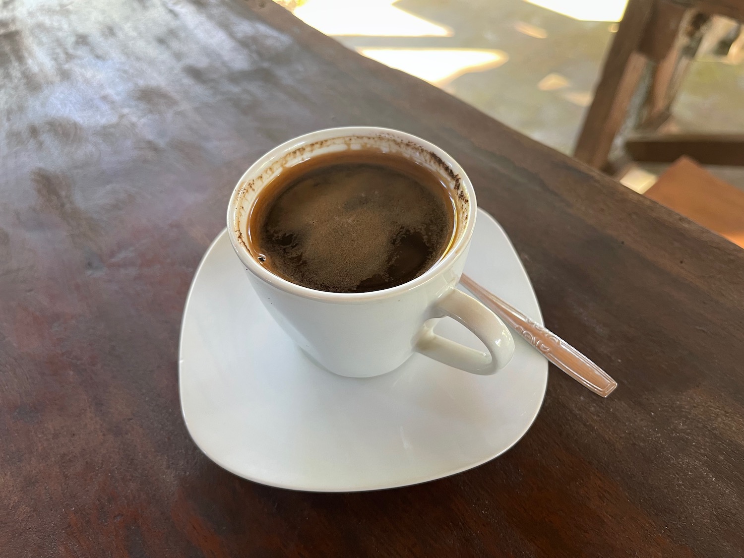 a cup of coffee on a saucer