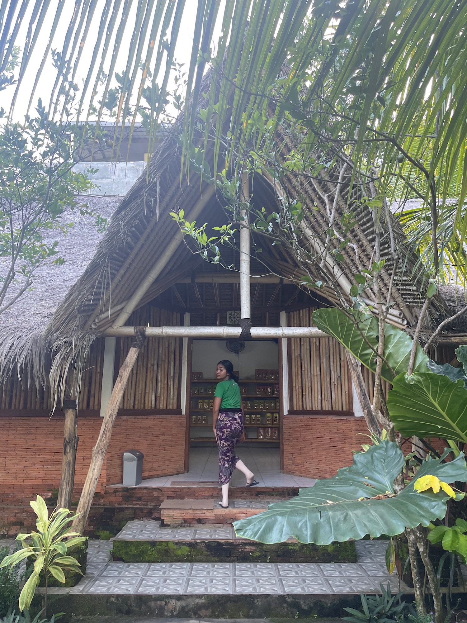 a woman walking in front of a building