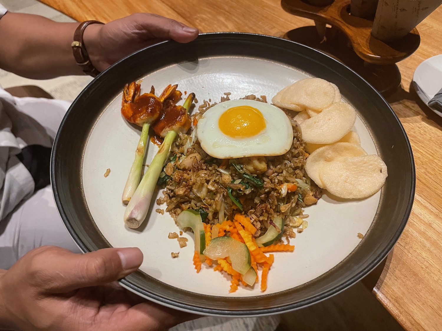 a plate of food with a egg and vegetables