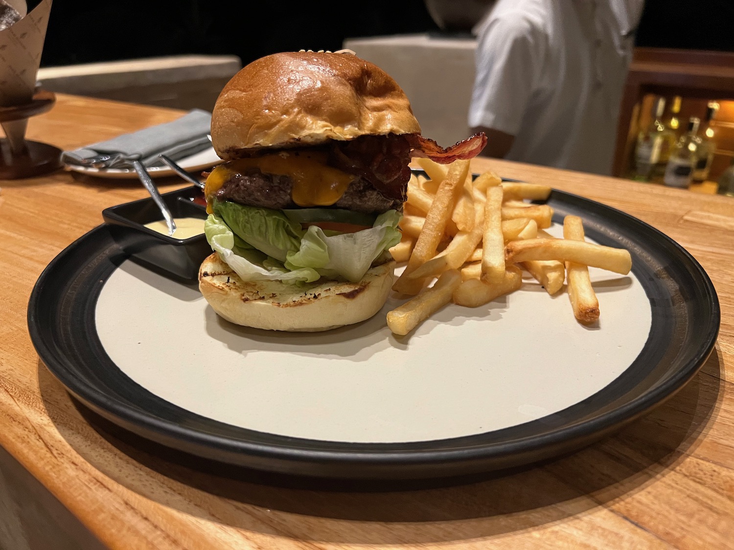 a burger and fries on a plate