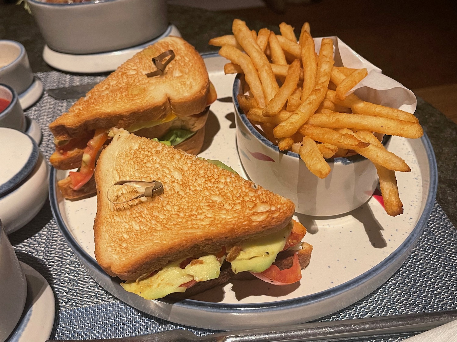 a plate of sandwiches and fries