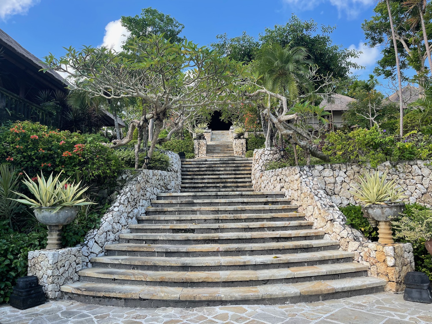 a stone stairs leading to a house
