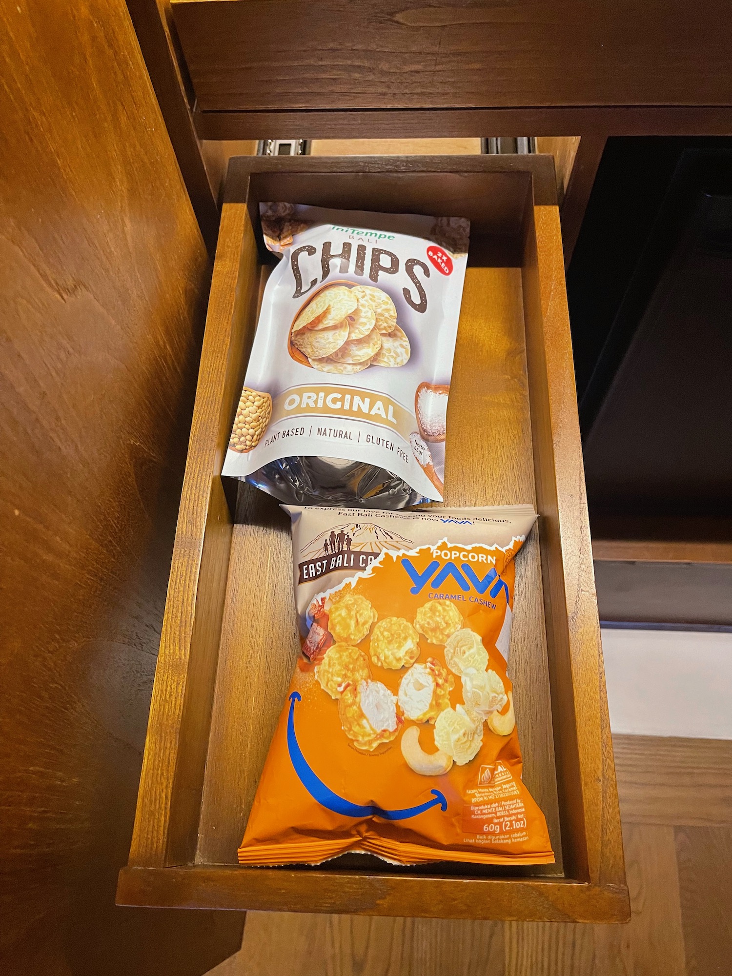 a drawer with chips and snacks