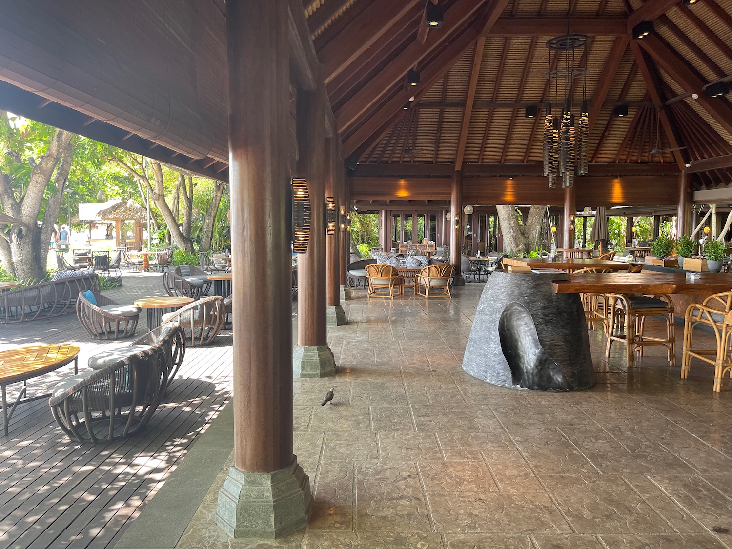 a large outdoor restaurant with tables and chairs