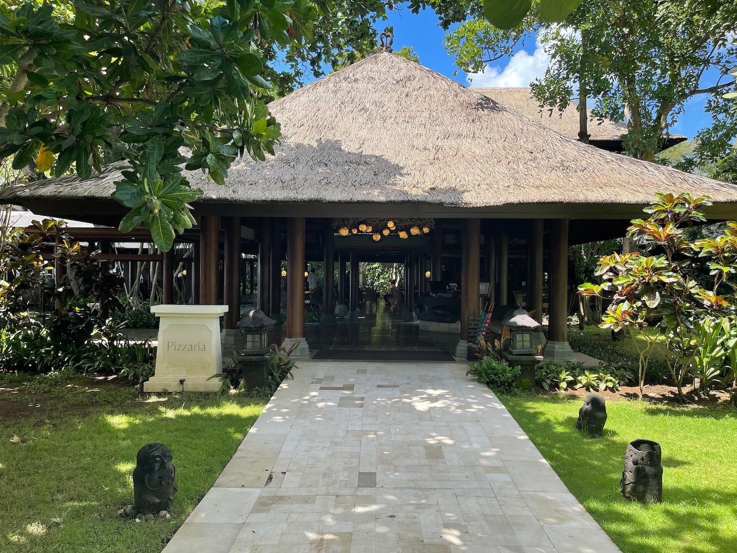 a building with a thatched roof