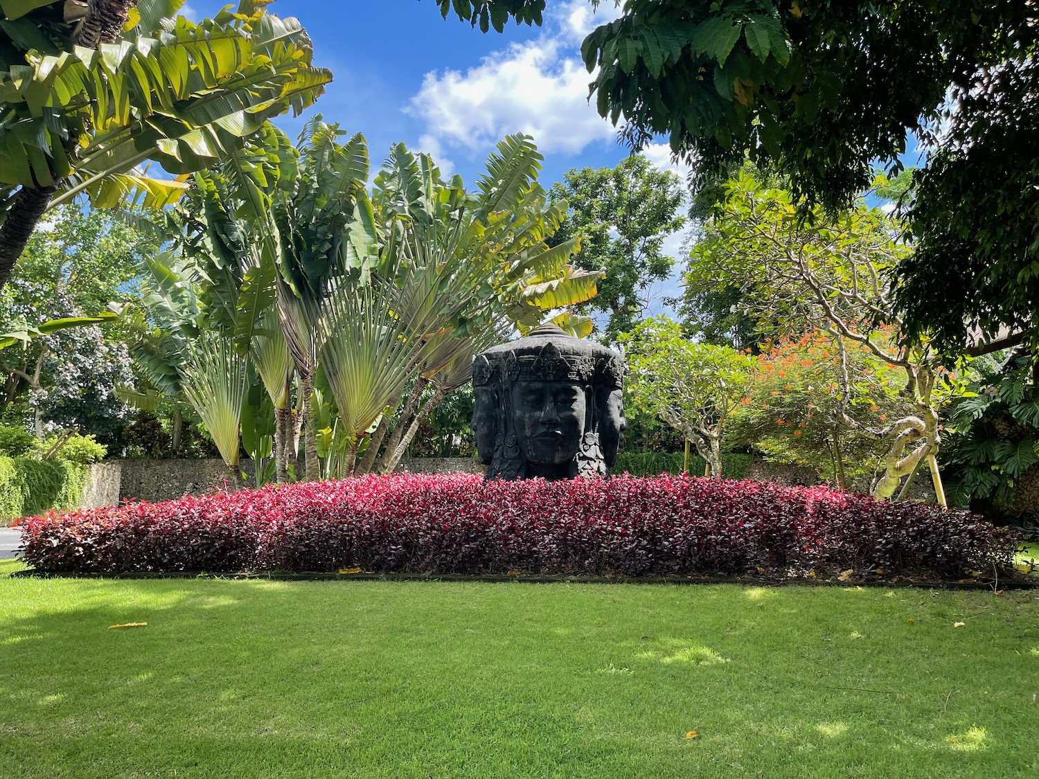 a statue in a garden