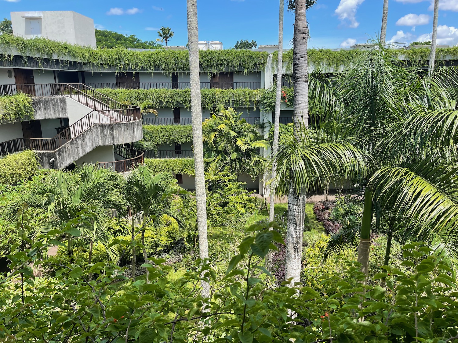 a building with trees and plants