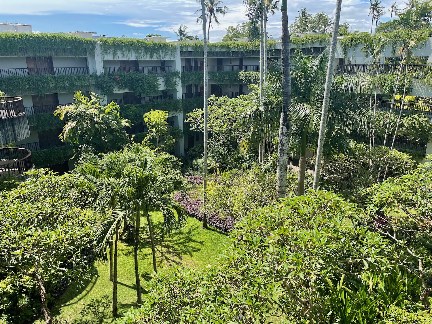 a building with trees and bushes