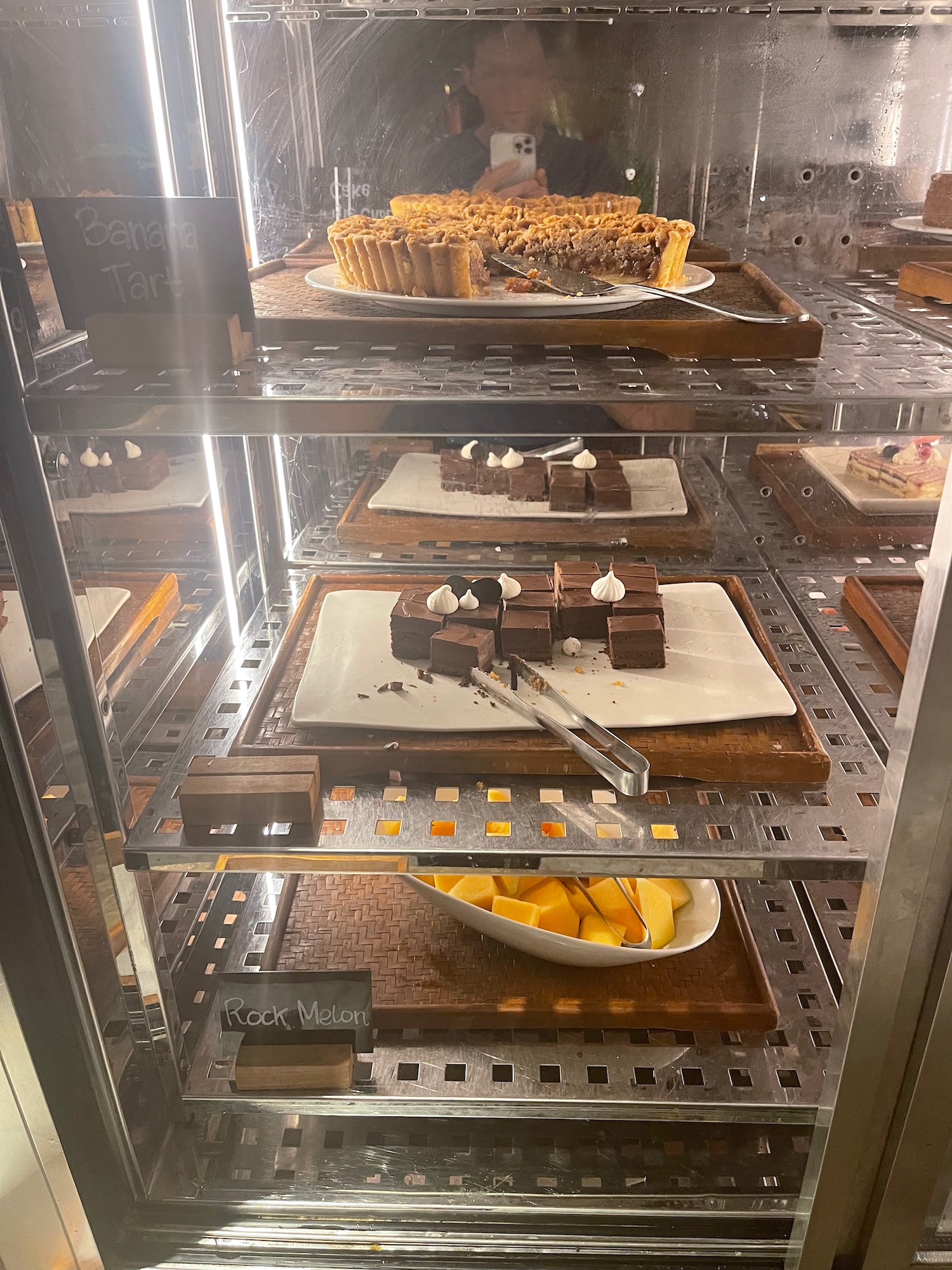 a display case with food on it