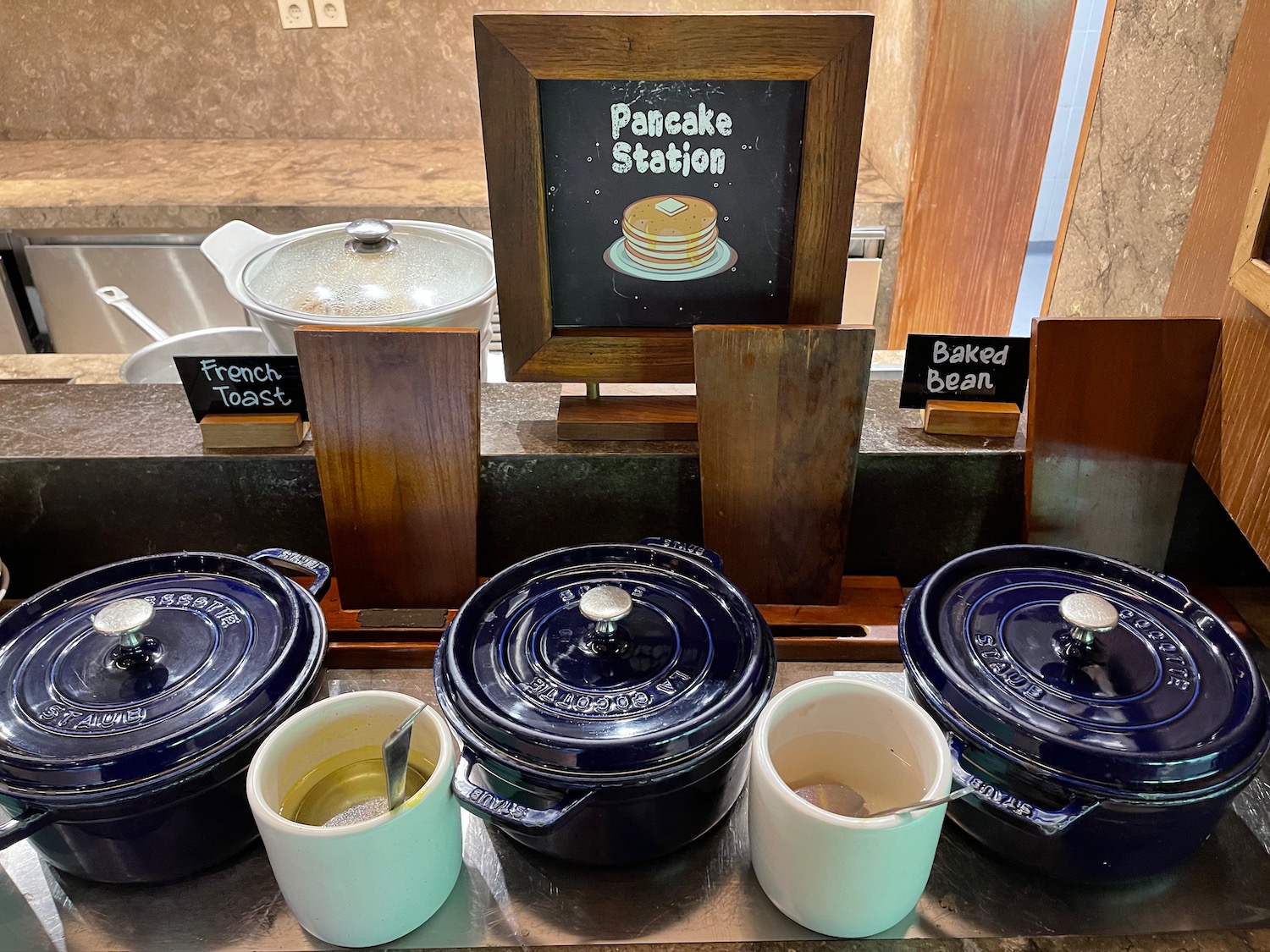 a group of pots on a counter